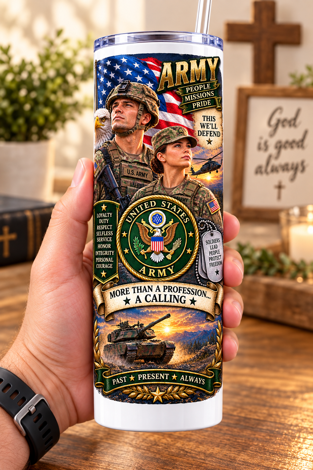 Hand holding a straight-sided 20 oz tumbler with Patriotism Army 3 artwork on a warm wood counter
